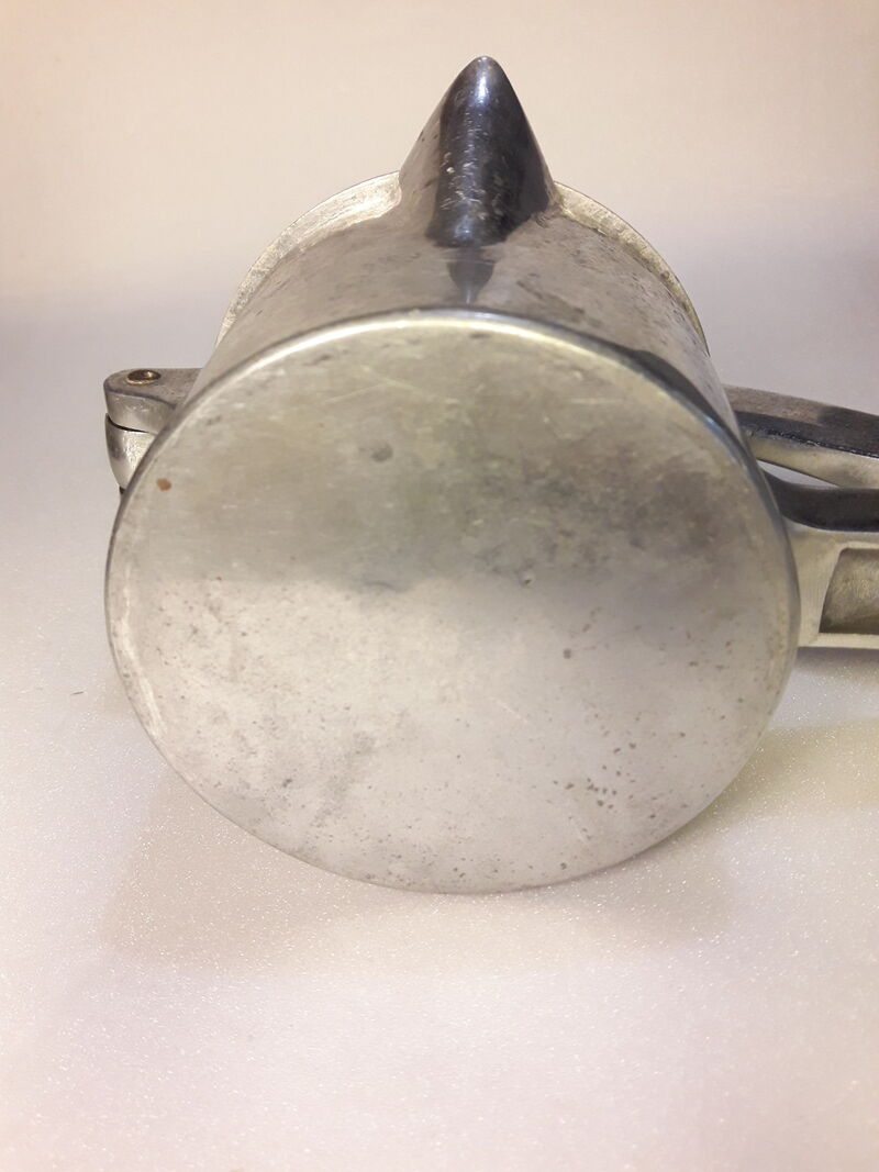 Vintage grapefruit metal citrus press