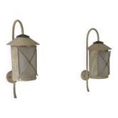 Pair of vintage wall lights in perforated metal, brass, and perspex, France, 1950.
