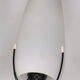 Louis Kalff opaline and metal wall light from the 1950s.