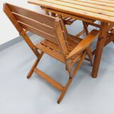Vintage garden furniture set consisting of a table with extensions and 4 armchairs