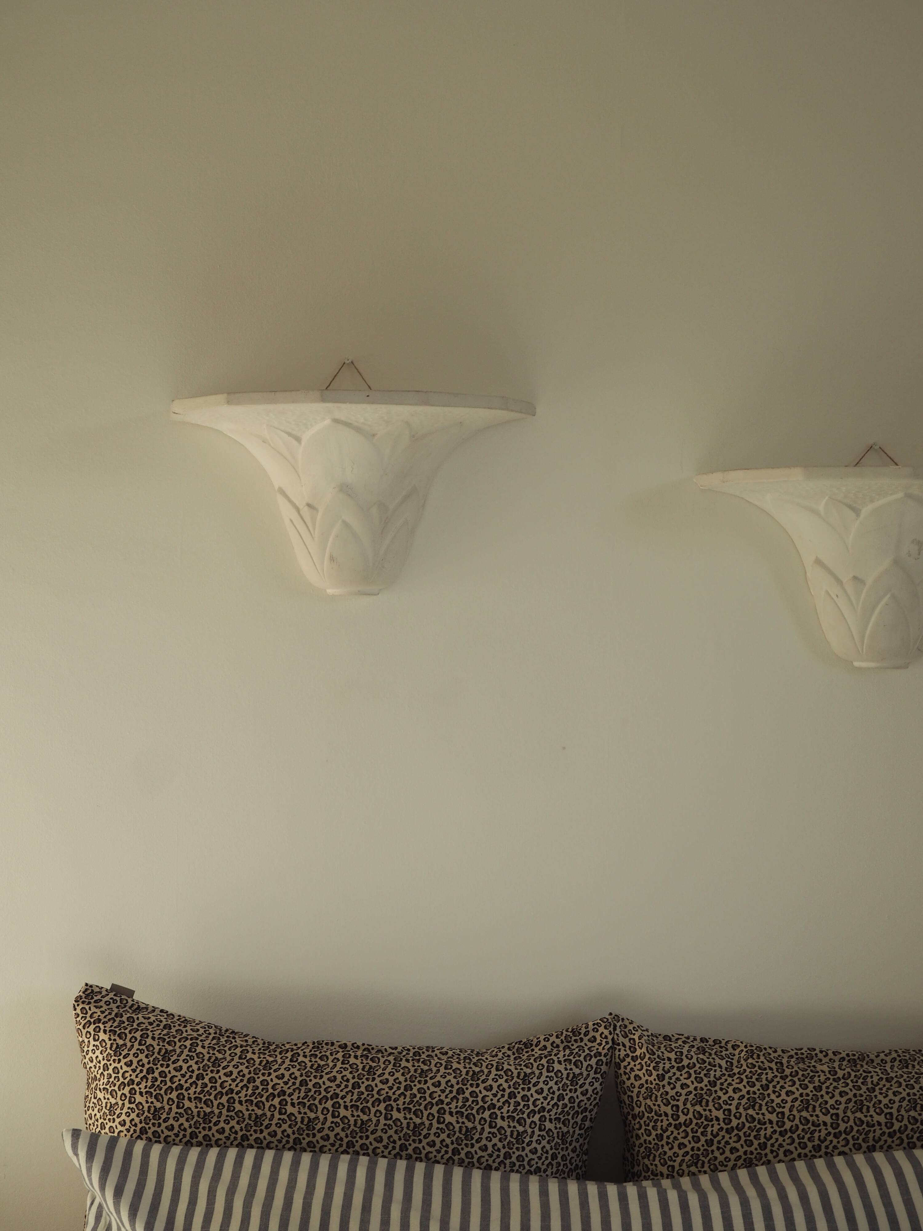 Pair of plaster wall sconces, palmette decoration, 20th century