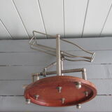 Old mechanical wine decanter on wooden base