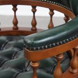 Dark green chesterfield office chair in cowhide leather on wheels