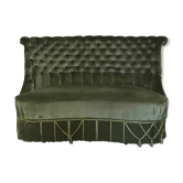 Toad in green velvet sofa