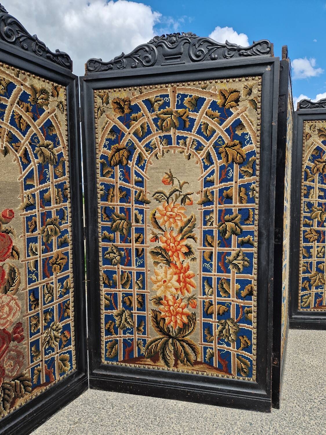 Folding screen in black-painted wood, 19th century