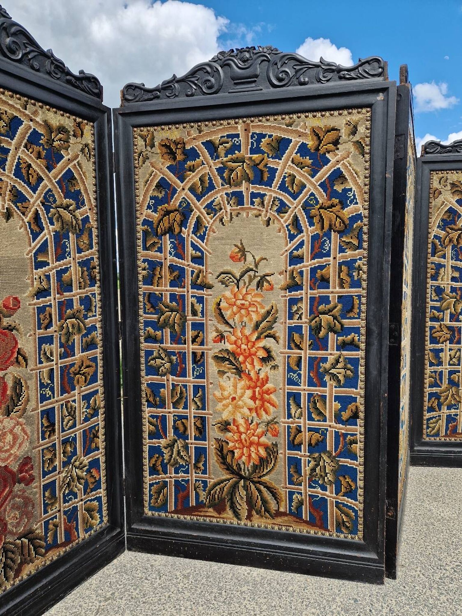 Folding screen in black-painted wood, 19th century