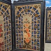 Folding screen in black-painted wood, 19th century