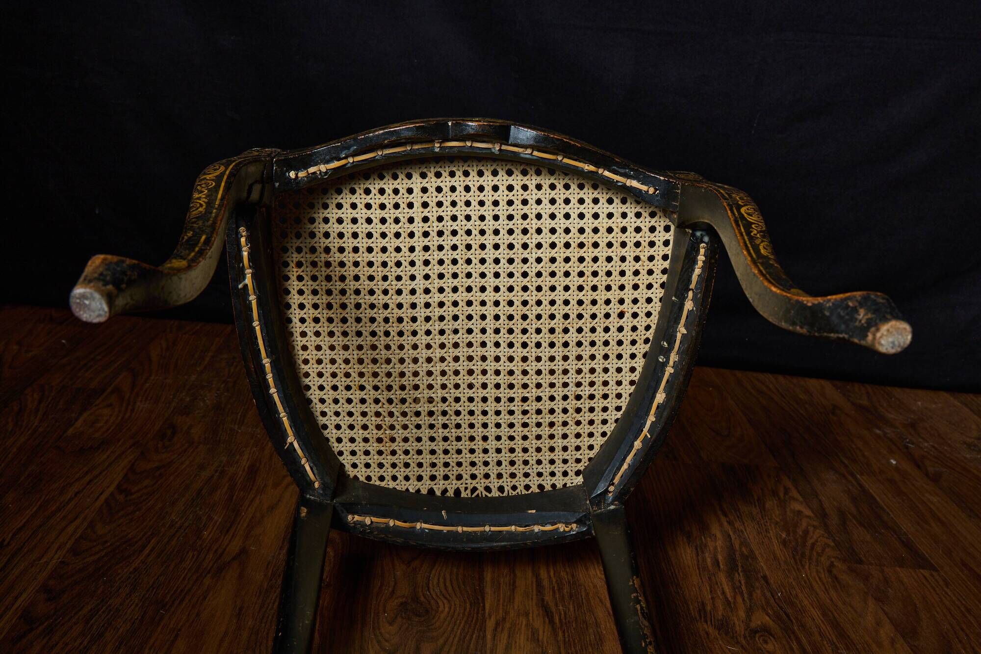Antique black and gold lacquered chair – Napoleon III style – caned seat