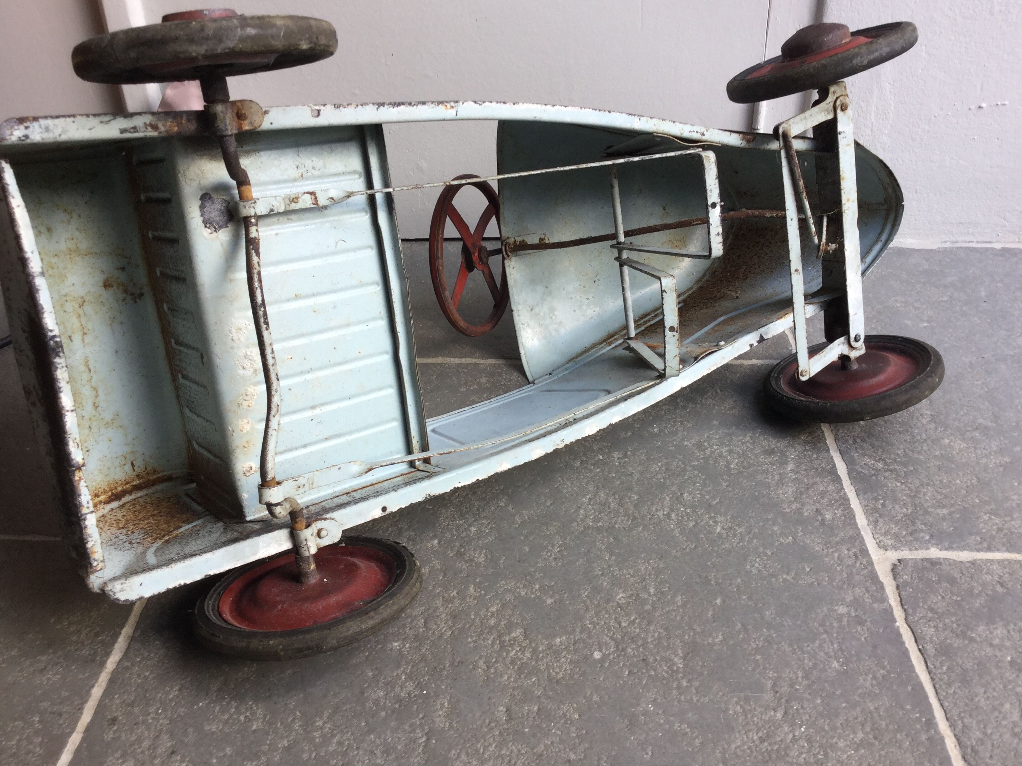 Old metal pedal car 1930