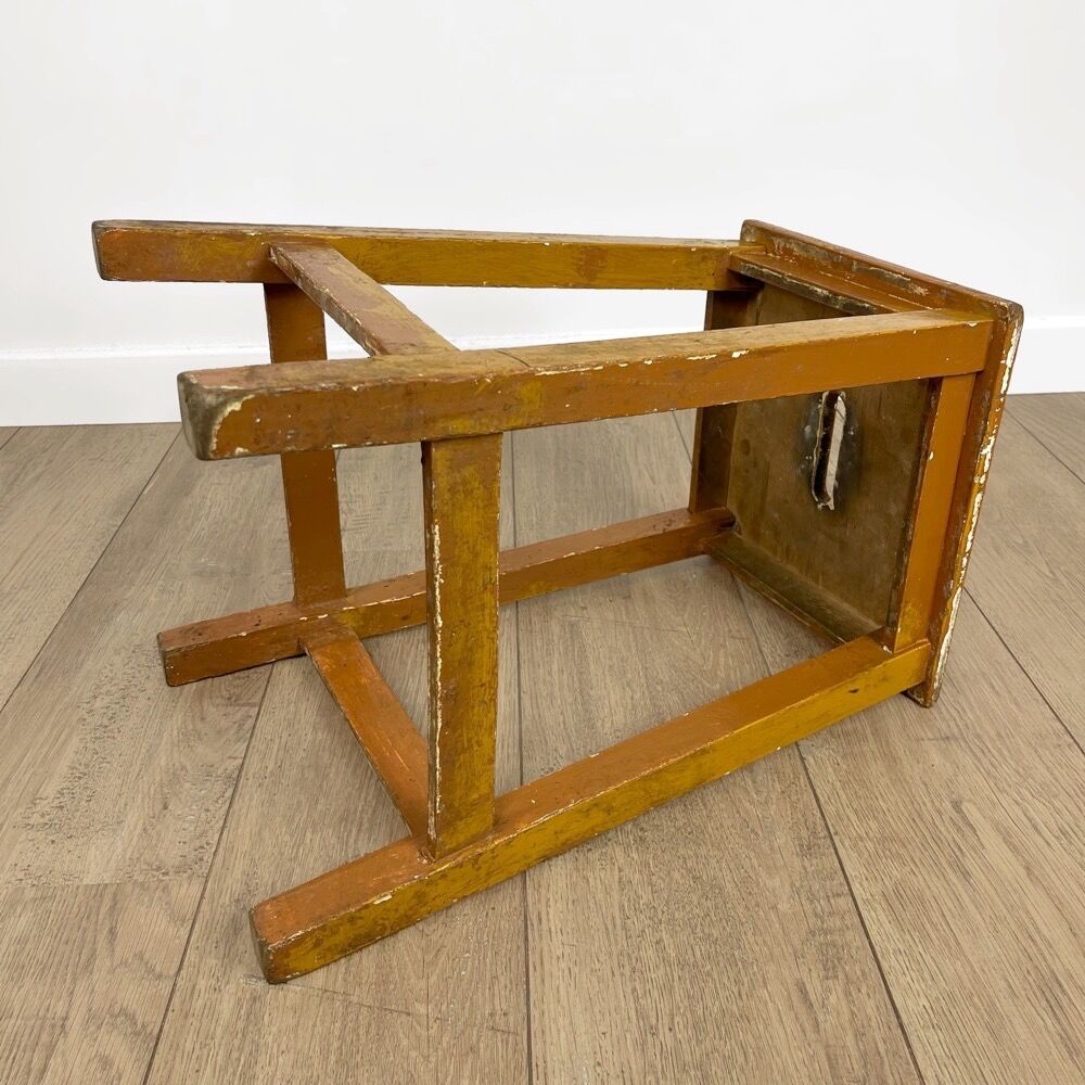 Old slotted milking stool