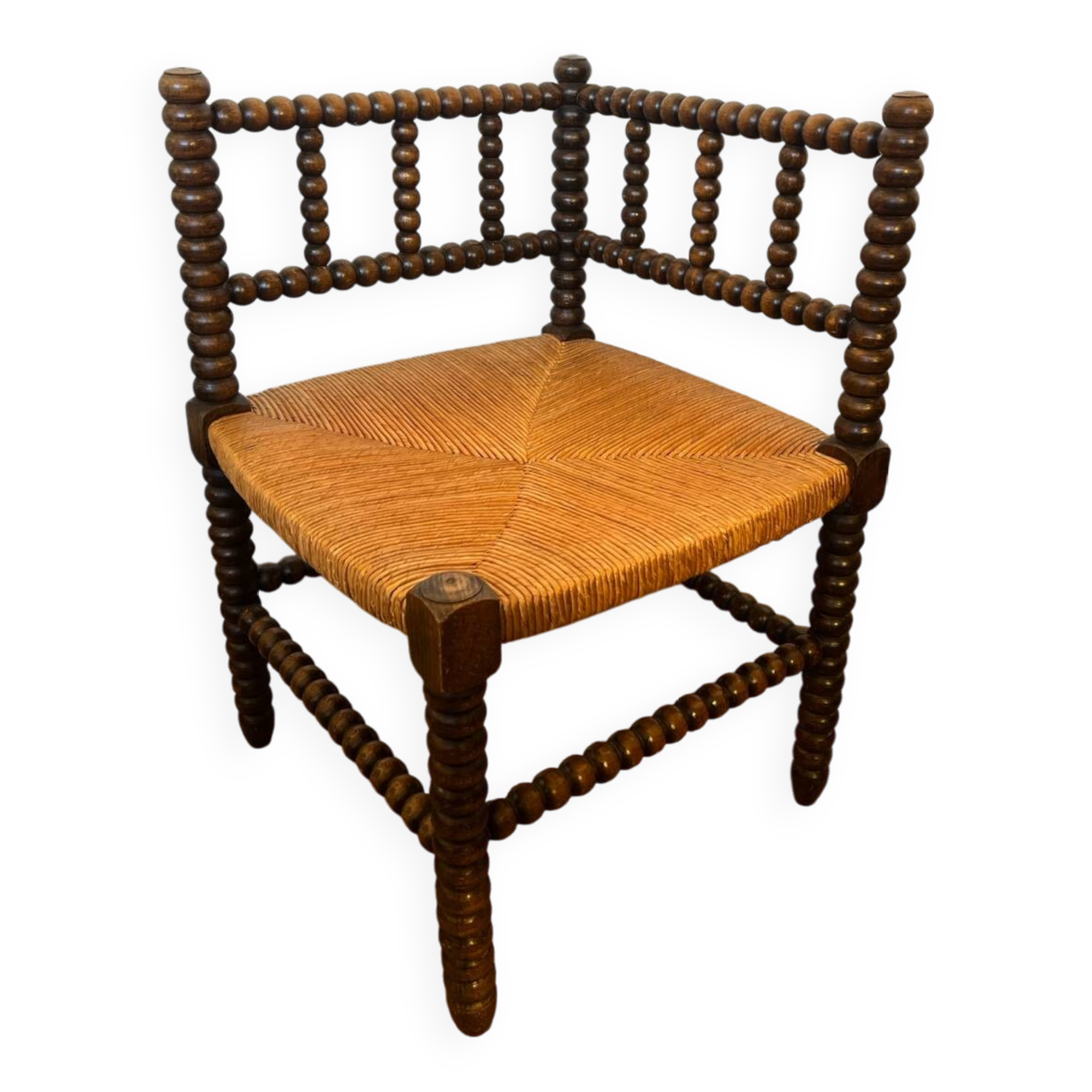 Corner chair in turned wood and straw