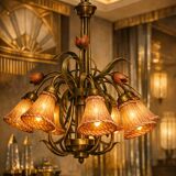 Antique Art Deco metal chandelier with a tinted glass shade.