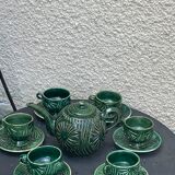 Service to the ceramic enamelled chiseled green and vintage