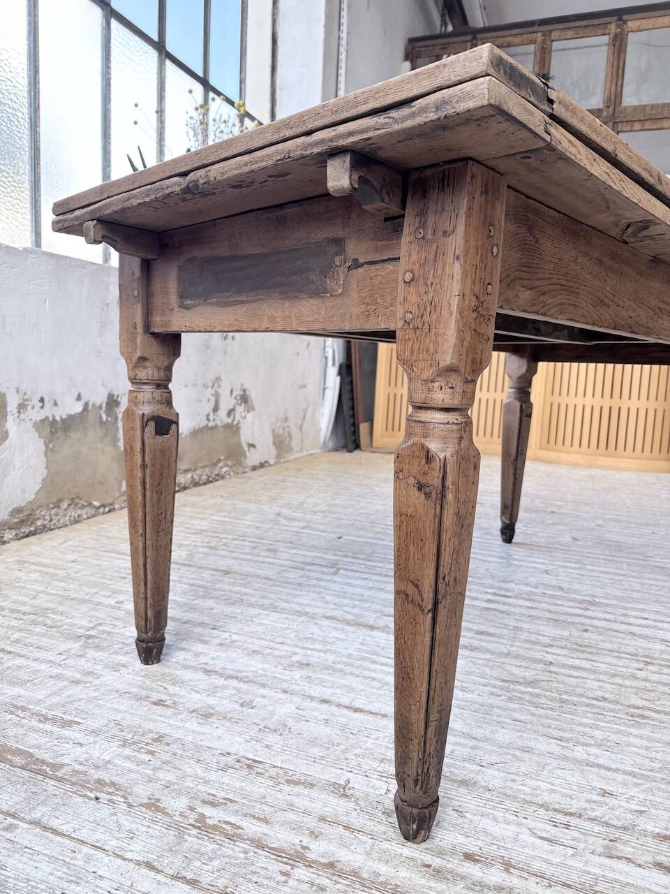 Solid oak farmhouse table with integrated extensions 1950