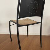 Set of 8 chairs in black lacquered metal and straw seats