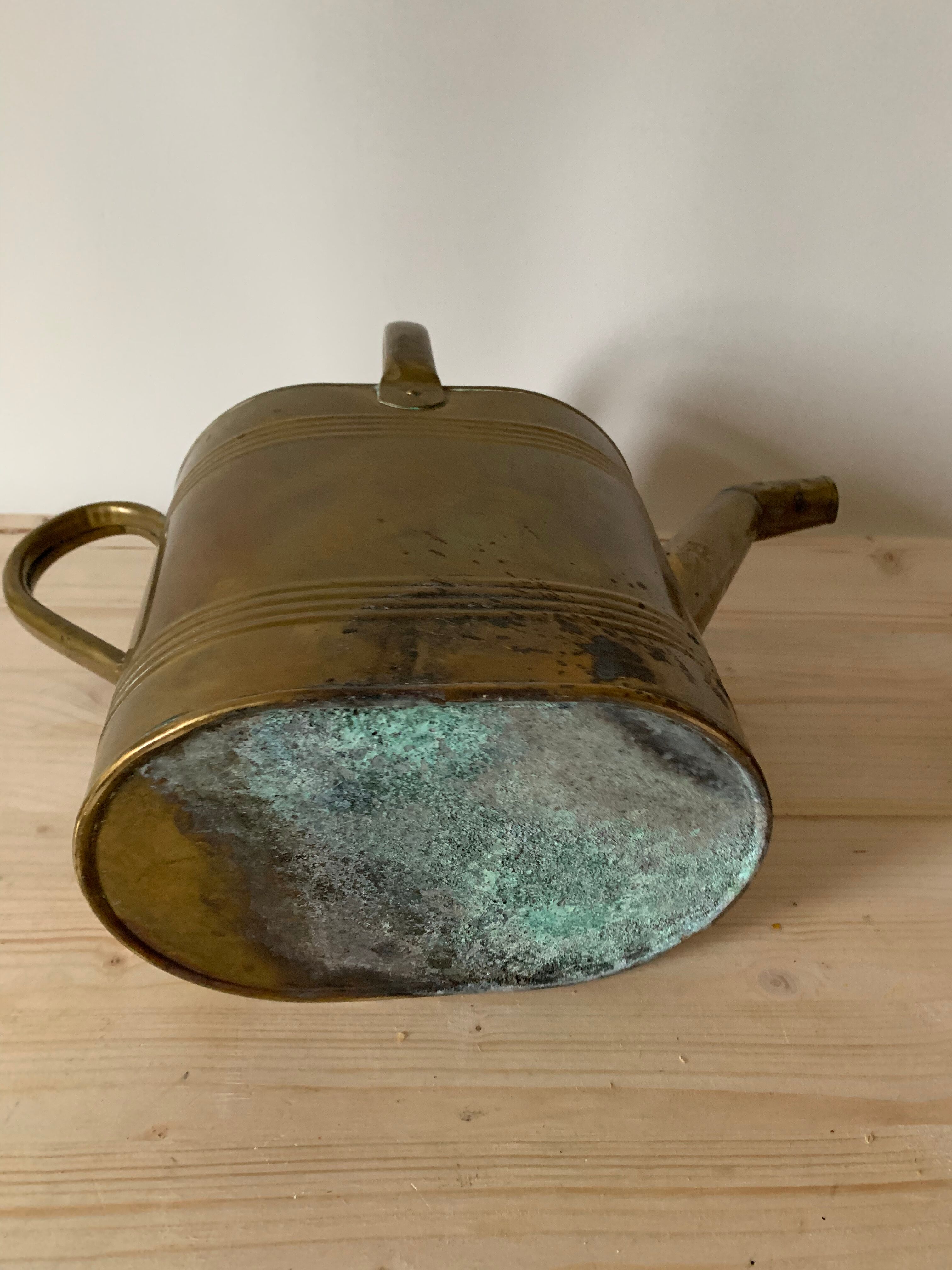 Brass watering can