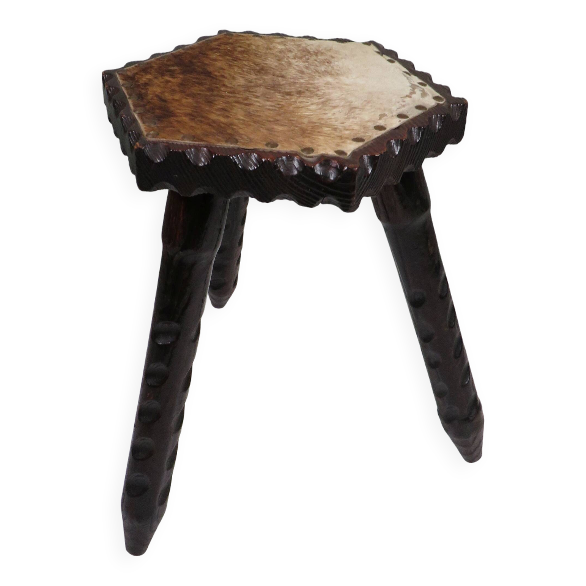 Vintage Spanish stool in carved wood with a leather seat.