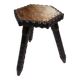 Vintage Spanish stool in carved wood with a leather seat.