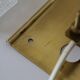 Pair of glass and brass wall lights by Carl Fagerlund for Orrefors.