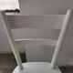 Set of 6 mismatched white chairs