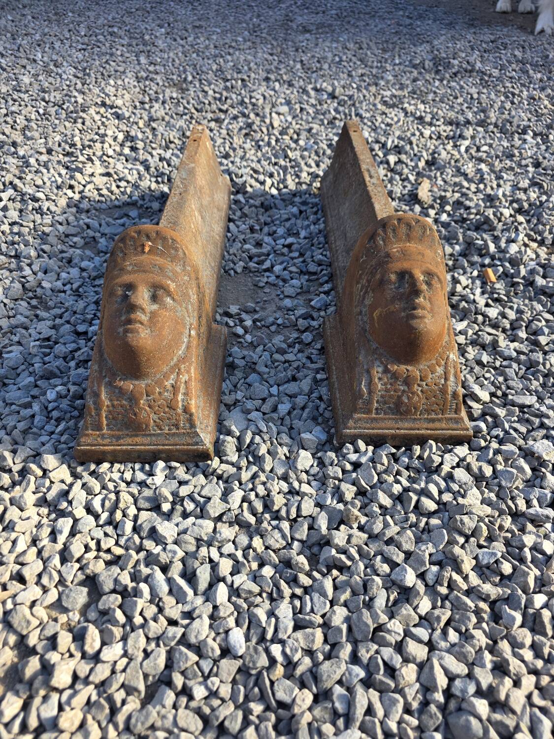 Pair of cast iron andirons from the 19th century.
