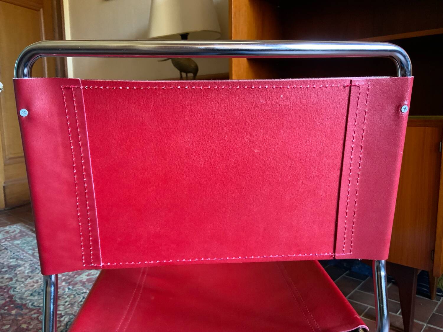 2 tubular chairs in red leather 1970