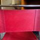 2 tubular chairs in red leather 1970