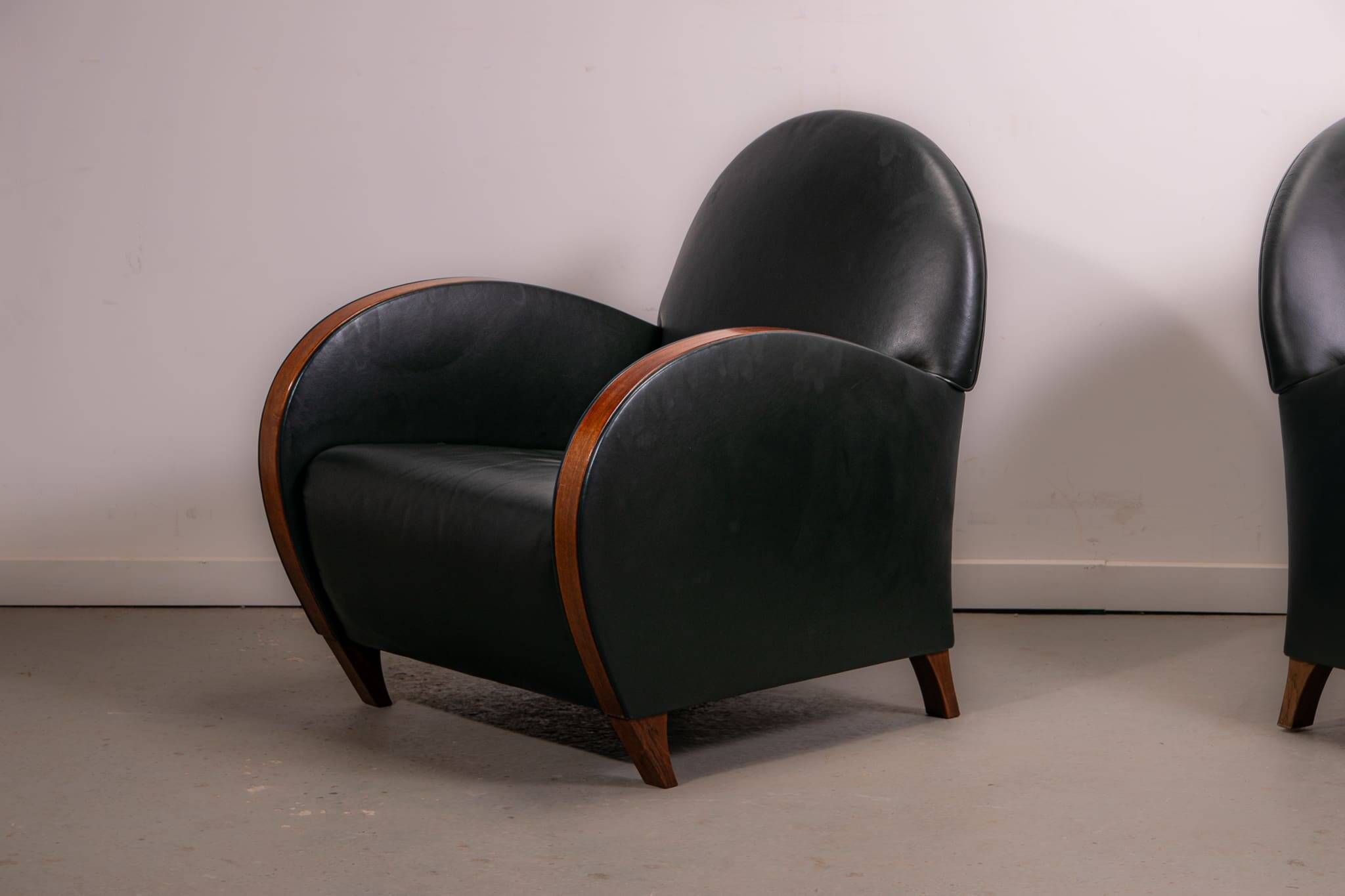 Pair of mid-century leather armchairs, circa 1970, made in Belgium.