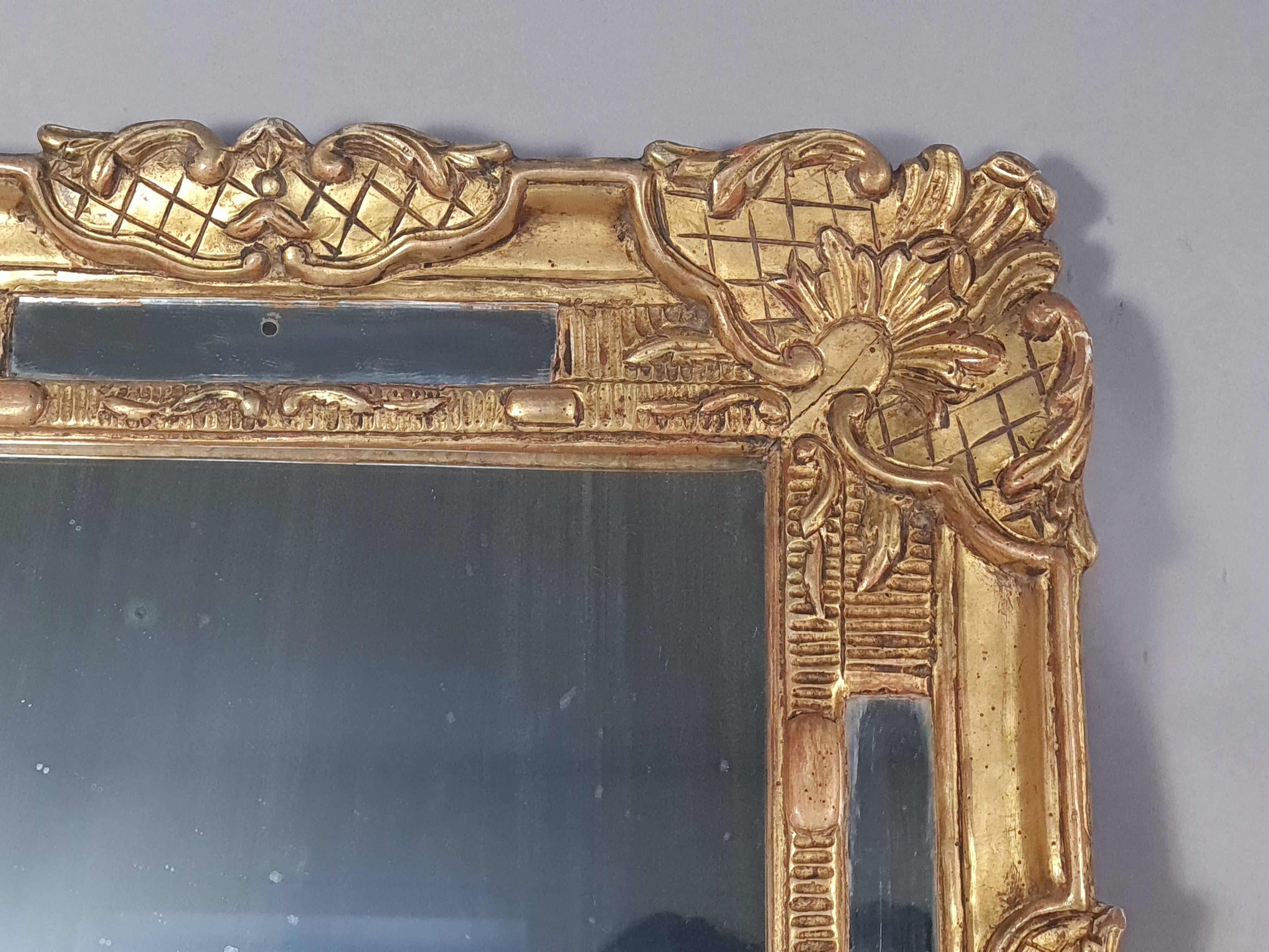 Antique mirror with carved wood frame and original gilding, 69x53 cm, C820.