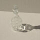 Small bottle with a glass cap with geometric patterns