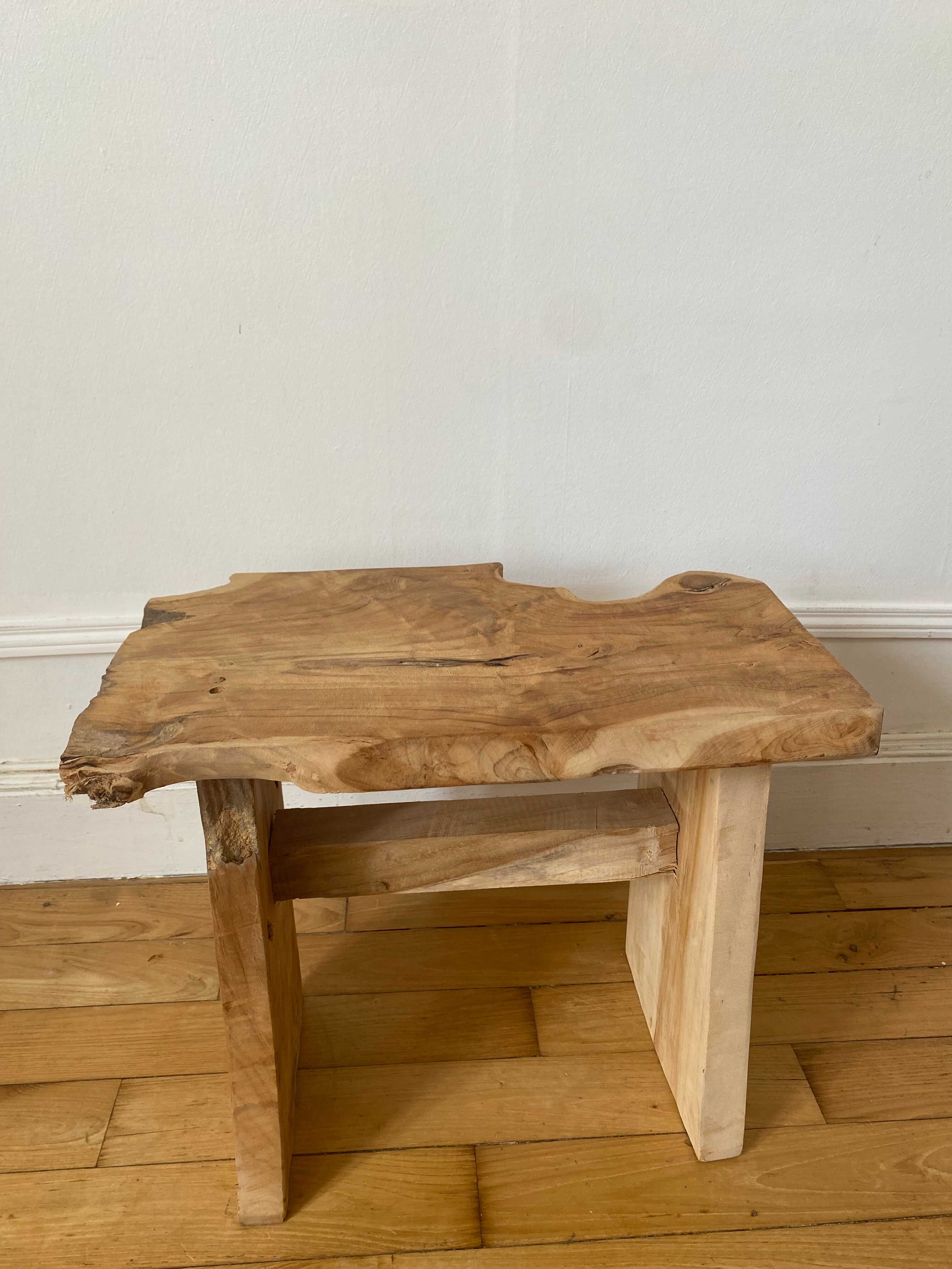 Low stool in raw wood