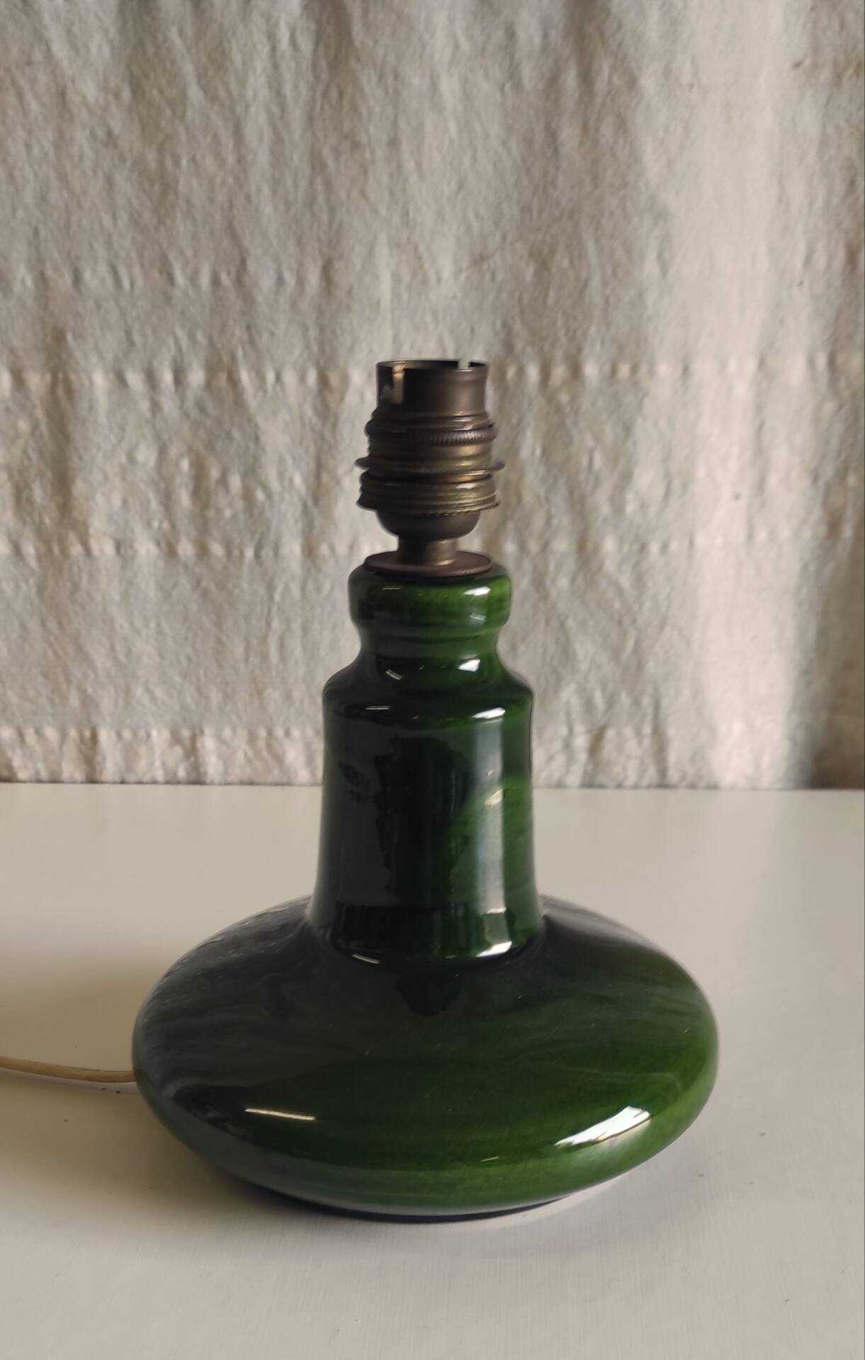 Green glazed ceramic table lamp base in Scandinavian style.