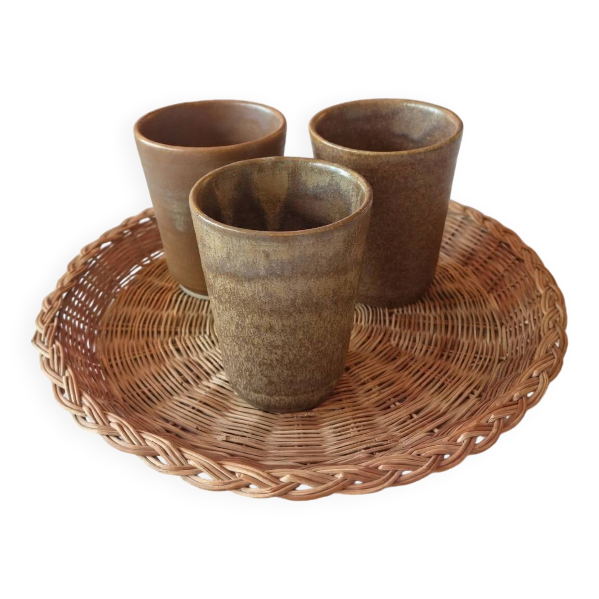 3 vintage 70s glazed stoneware cups and the wicker tray.