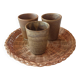 3 vintage 70s glazed stoneware cups and the wicker tray.