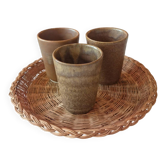 3 vintage 70s glazed stoneware cups and the wicker tray.