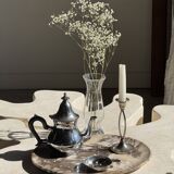 Silver-plated teapot with black handle