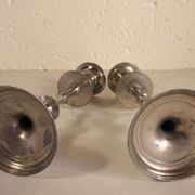 Pair of candlesticks in silver metal