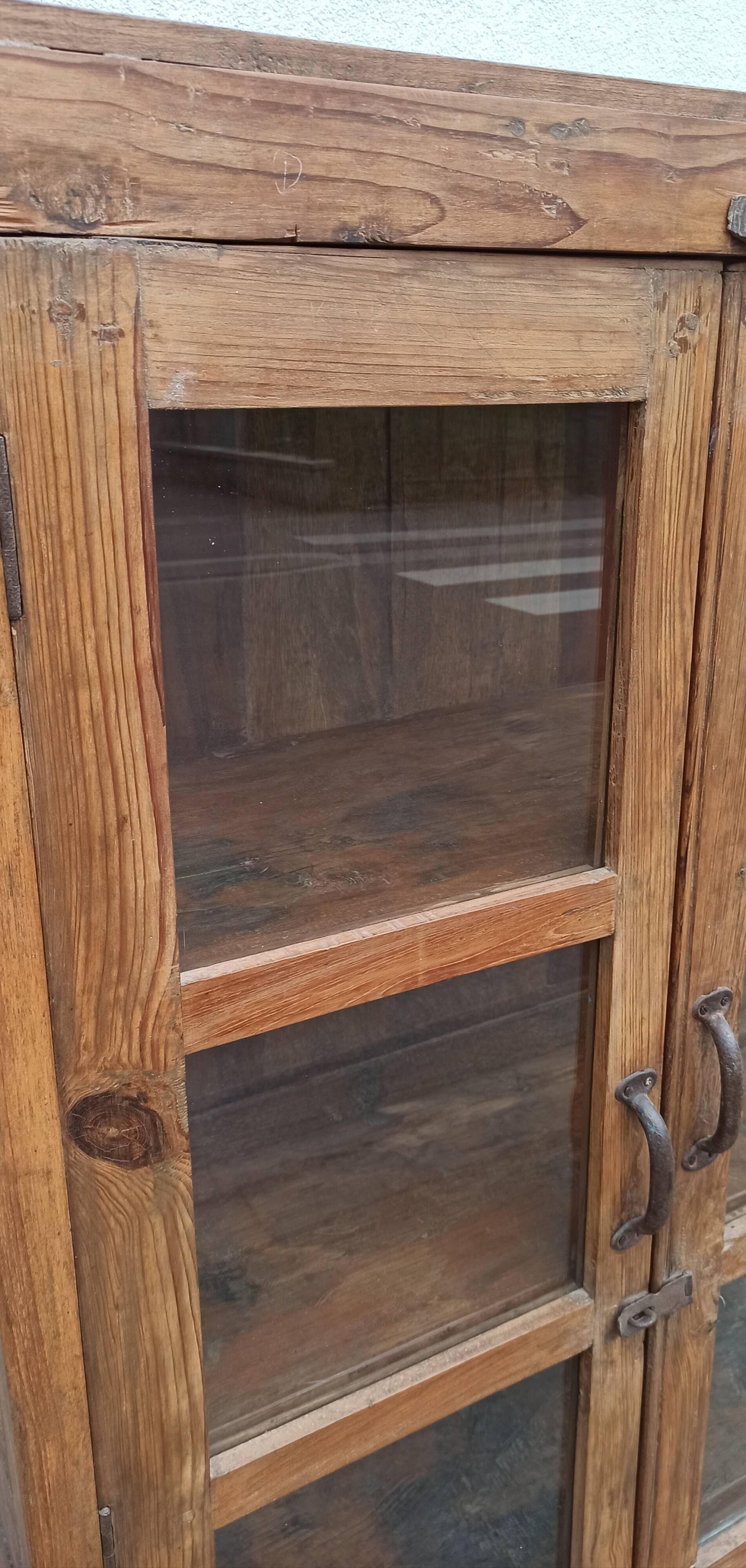 Old wooden cabinet display case with two doors