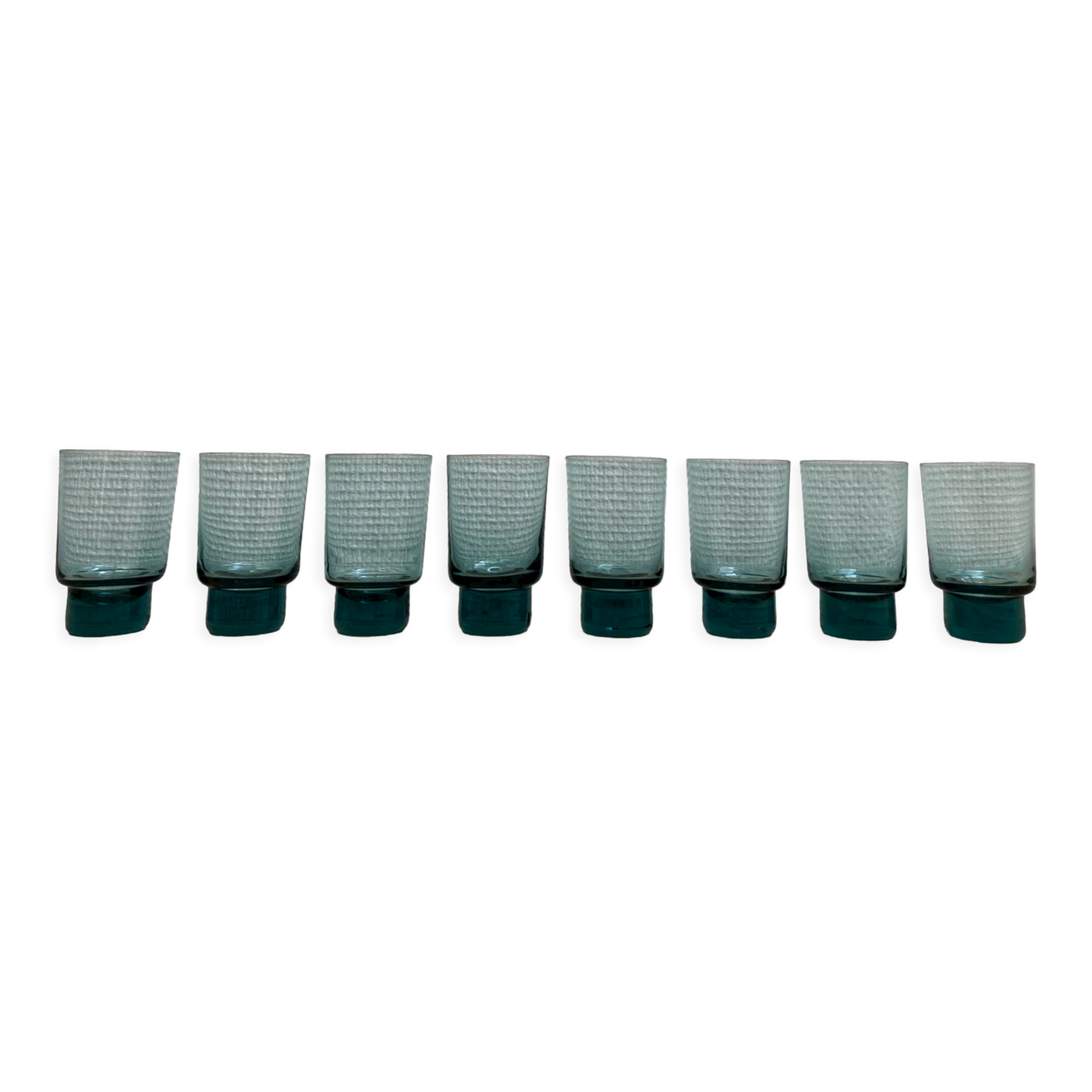 Eight bluish glass water glasses