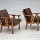 Fauteuil danois des années 1970, revêtement en laine verte, bois de chêne massif.