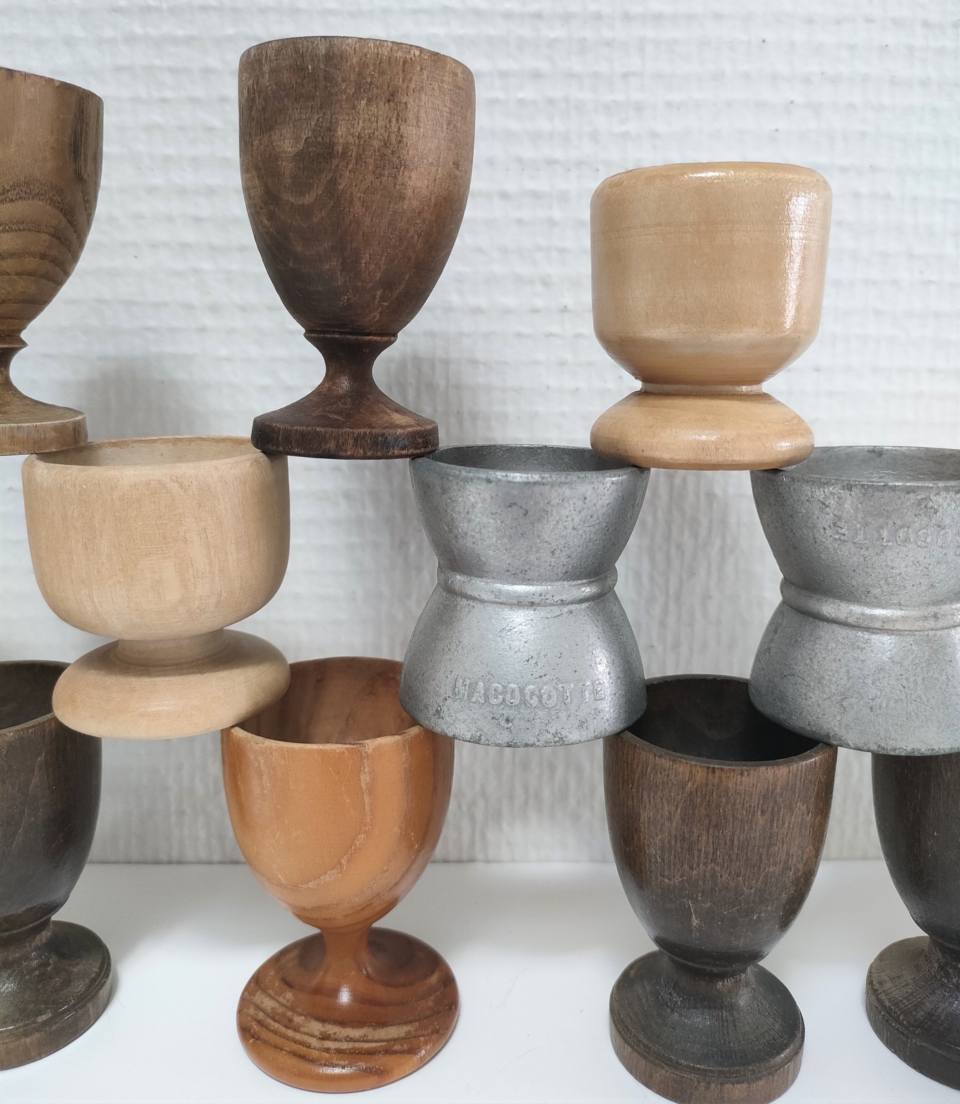 Set of twelve turned wood shells and vintage aluminum