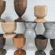 Set of twelve turned wood shells and vintage aluminum