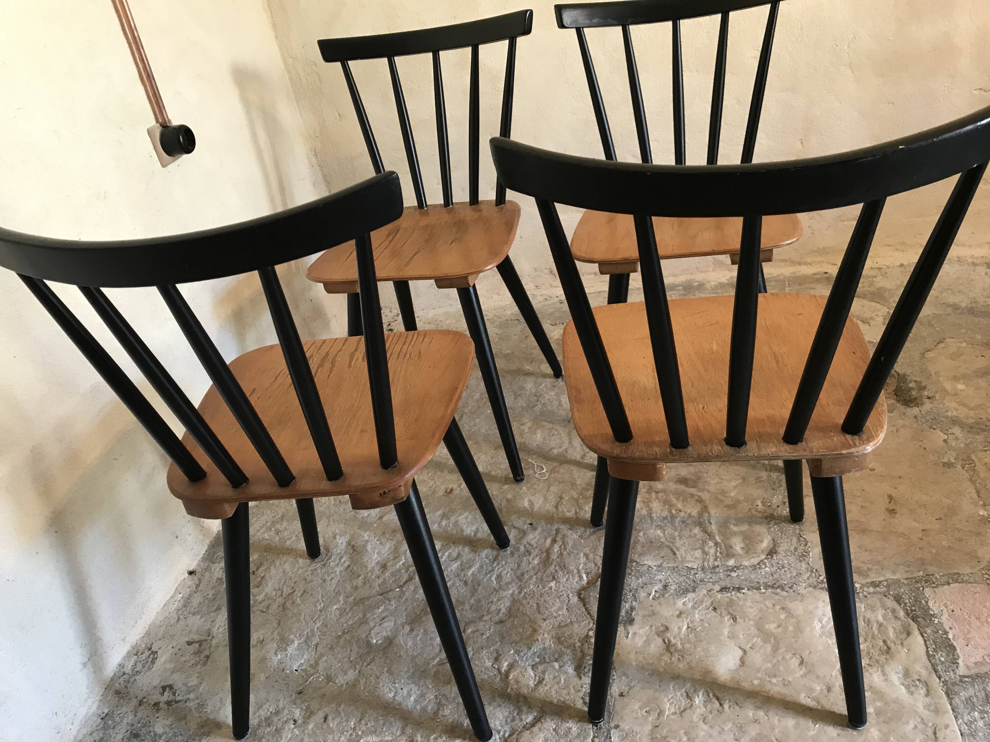 Set of 4 vintage 1960's chairs with bars and black compass legs