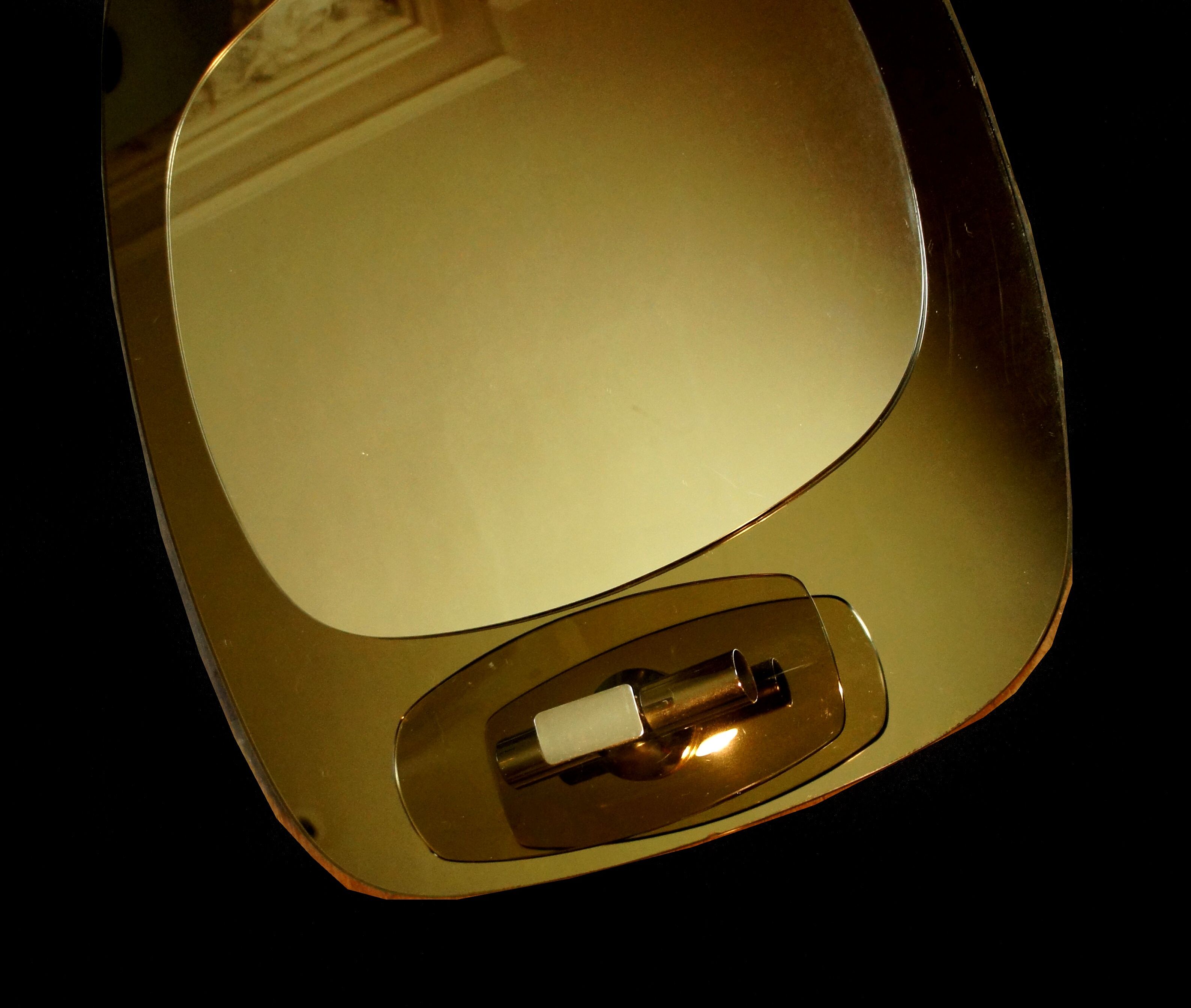 Light mirror in bronze tinted curved smoked glass