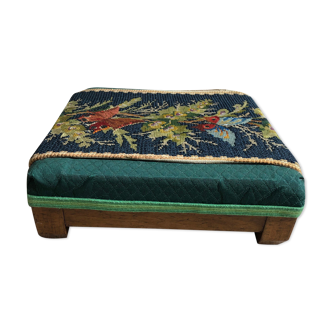 Walking foot rests foot old tapestry