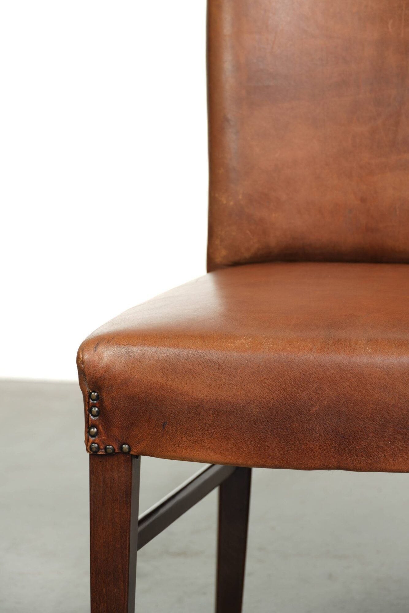 Set of 6 sheepskin dining chairs in a cognac colour with a lovely patina