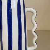 Klein blue and white striped ceramic vase with abstract handmade wavy handles