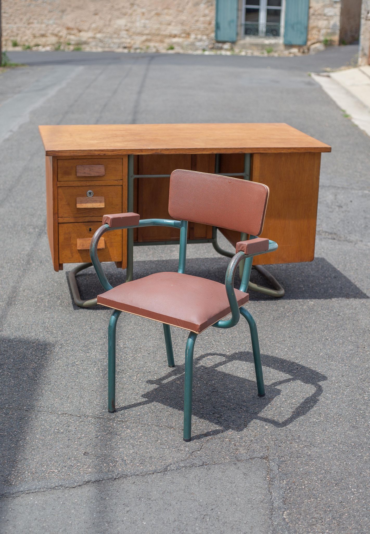 School teacher's chair in imitation leather and tubular metal