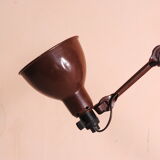 Articulated lamp with a vice