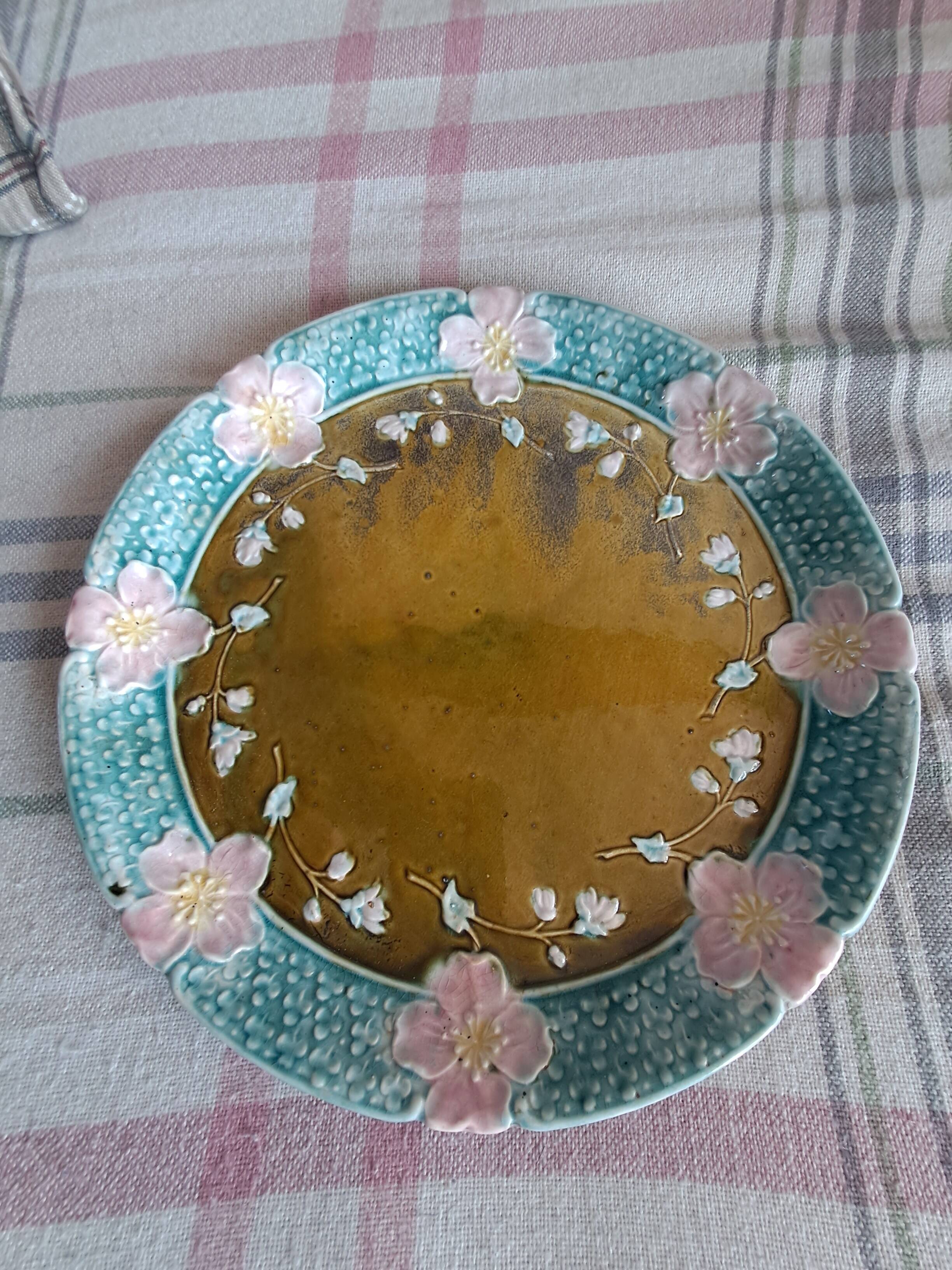 Vintage barbotine plate by Gustave de Bruyn.